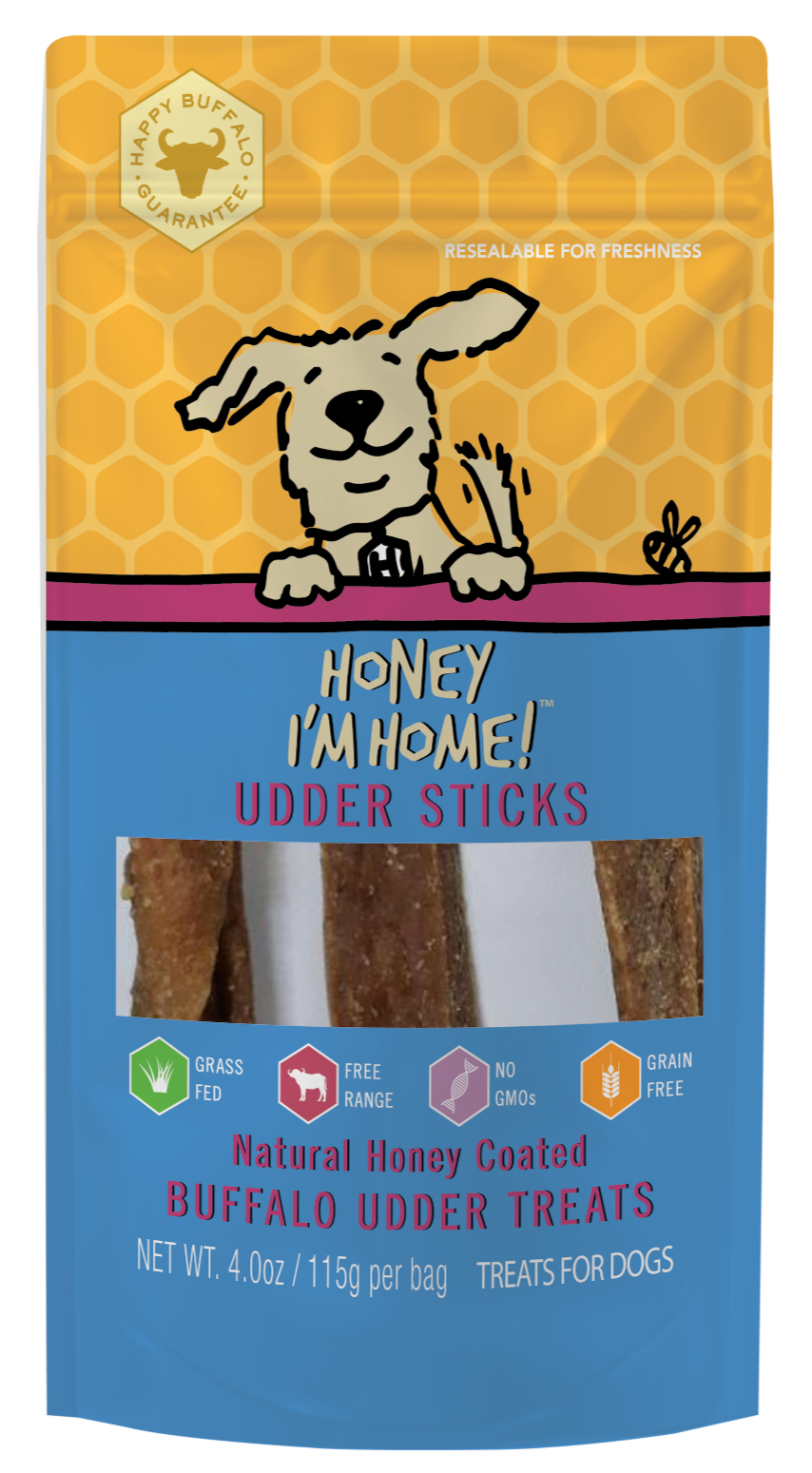 3.5 oz. (approx.) yellow & blue pkg. of udder sticks with clear window showing treats