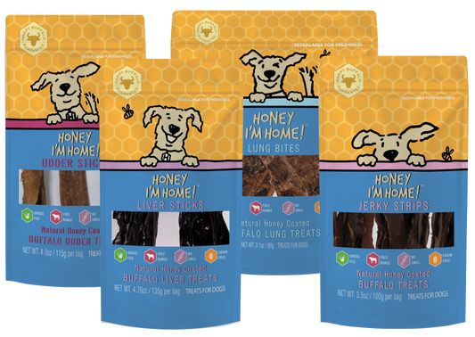 four 3.5 oz. (approx.) yellow & blue pkgs after advent bundle dog treats: strips, sticks and bites. 