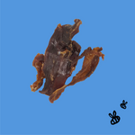 piece of buffalo and honey beef jerky on a blue background. two small bees in bottom right corner